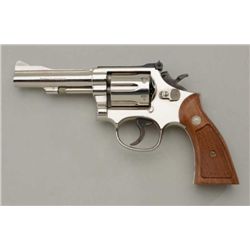 Smith & Wesson Model 15-4 DA revolver, .38  cal., 4” barrel, nickel finish, checkered  wood medallio