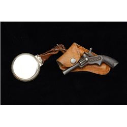 Hamilton 21 jewel railroad watch and small  cap pistol in leather holster.  Watch is in  very good c