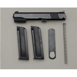 Colt Ace .22 conversion unit consisting of a  slide, barrel, spring, barrel bushing and two  magazin