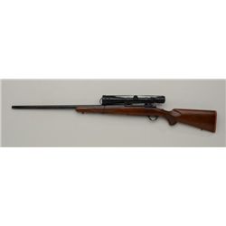 Ruger Model 77 bolt action rifle, .220 Swift  cal., blue finish, checkered wood stock with  bull bar