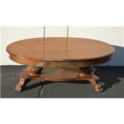 Antique quarter sawn oak claw foot oval oak  coffee table, approx. 4 feet long  X 2-1/2  feet  wide 