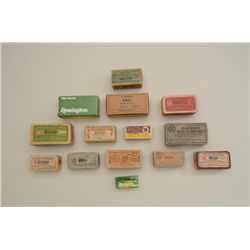 Lot of 14 boxes of mostly antique ammo: one  box of US blue label ammo, .44 RF, for Henry  and Winch