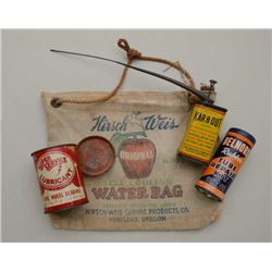 Bonanza lot of automobile related  collectibles including old engine oil cans,  car wax, rubber tire