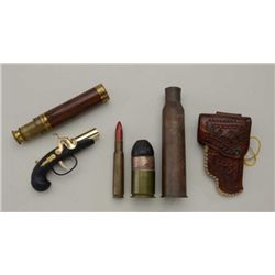Misc. lot including two leather holsters,  several inert display cartridges, a P38  magazine, two li