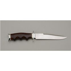 Custom knife by F. Norton, approx. 10-1/2”  overall with a 6” blade, finger groove exotic  wood grip