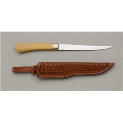 Daniel’s marked custom filleting knife and  basket weave leather sheath, approx. 10”  overall with a