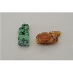 Two carved Chinese pieces of jade tortoise  and tortoise and snake. Est.:$300-$400.