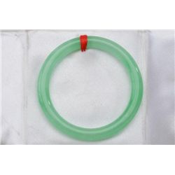 One fine quality green jade bangle bracelet.  Est.:$100-$200.