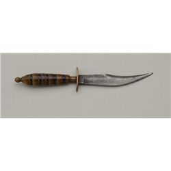Diminutive mid-eastern style clip point  knife, approx. 6” overall with a 3-1/2”  blade, stacked hor