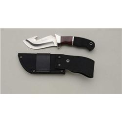 Junglee knife with sheath in like new  condition with factory box, approx. 9”  overall with a 4” bla