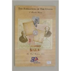 Folio containing state quarters from first 13  states. 13 each from Philadelphia and Denver  Mint. 2