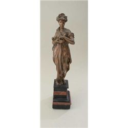 Ancient style goddess in art metal casting on  fancy layered stone base. 20" in height.  Copper fini