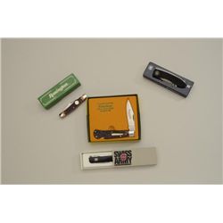 Lot of 4 collector knives, all in their  factory boxes including a Remington Silver  Bullet Tracker 