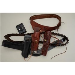 Bonanza lot of leather holsters and belts  including a Lawrence basketweave belt and  single action 