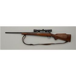 WINCHESTER MODEL 70 POST 64 BOLT ACTION RIFLE  IN 30-06 CAL #780132.  WEAVER SCOPE 2-1/2 TO  7 POWER