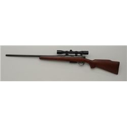 EARLY 788 REMINGTON BOLT ACTION RIFLE IN  22-250 CAL #041214.  2-1/2-8 POUR STOEGER  SCOPE ON FINGER