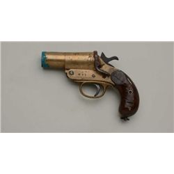 W.W. Greener brass flare pistol with wood  grips in overall fair condition, good action,  muzzle sho
