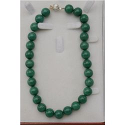 One strand of jade bead necklace measuring  14mm and is 16 inches long. Est.:$250-$500.