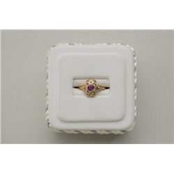 One vintage 14k yellow gold ring set with a  round ruby. Est.:$150-$300.