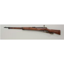 Japanese Arisaka bolt action rifle, Type 38,  6.5mm cal., dust cover intact, leather sling,  #823, c