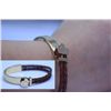 Image 1 : HALF BRASS HALF ROPED BROWN LEATHER BRACELET