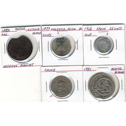 World Error coinage.  Includes four coins with clips from, Great Britain, Mexico, Spain, Malaysia an