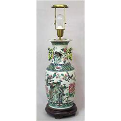 A standing vase porcelain, China, second half of 19 th century, mounted lamp, h 50 cm 1.500-2.000...