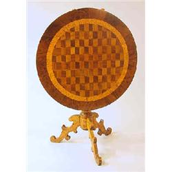 A tilt top table several woods, late empire, 20 th century, inlays, h 113 cm, diameter 67 cm 4.000-6