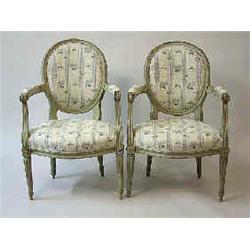 A pair of armchairs beech, Louis XVI, France 25.000-30.000...