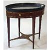 Image 1 : A tray table mahogany, late gustavian, höjd 75 cm; minor damage 25.000-30.000...