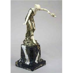 A sculpture ivory and metall, signerad E. Preiss, art deco, with marble base, h 26 cm 15.000-20.000.