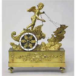 A mantle clock gilded bronze, empire, France, circa 1820, h 33 cm, length 27 cm 12.000-15.000...
