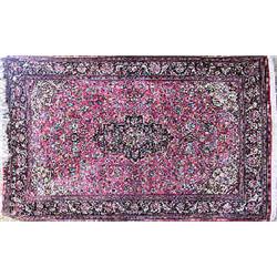 A Ghom/silk rug Persian, 220 x 139 cm; minor damage to edge 8.000-10.000...