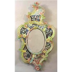 A mirror venetian, 19 th century, polychromatic glass, h 120 cm, damage 3.000-5.000...