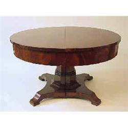 A dinner table polished mahogany, biedermeier, Germany, diameter 134 cm 20.000-25.000...