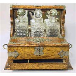 A decanter box with 3 decanters England, baroque style, second half of 19 th century, polished oak,.