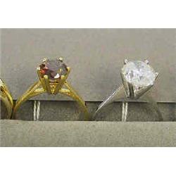 A ring 18 carat gold, solitary, cognac coloured diamond 2,08 ct 15.000-18.000...