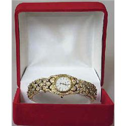 A ladies wristwatch 18 carat gold, Sidra, Italy, decorated with 174 brilliants 15.000-18.000...