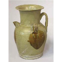 A jug stoneware, China, circa 800 A.D., green glazed h 20 cm; chipped and repaired 3.000-4.000...