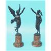 Image 1 : A pair of 19th century bronze figures of classical female muses holding a wreath and sword, on cy...