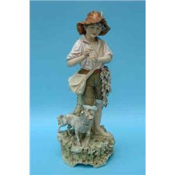 A Royal Dux porcelain figure of a peasant shepherd boy with dog at foot, 17ins. (some repairs) (S...