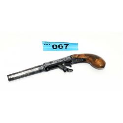 Early 19th century pocket pistol with carved grip