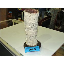 Beautifully carved ivory depicting island life