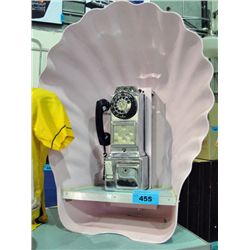 Soda fountain diner shell covered payphone