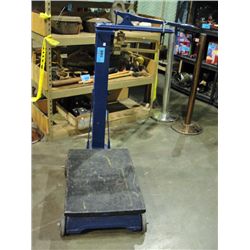 Early 1900s blue and brass platform scale