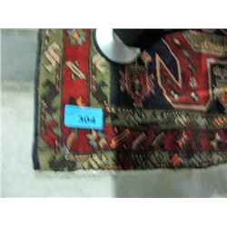 Approx 10F by 4F hand knotted persian area rug