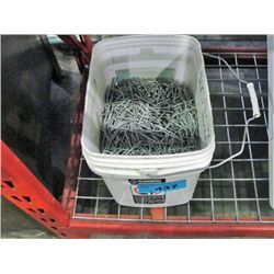 White pail filled with galvinized nails