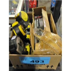 Box of copying saw blades and tape measures