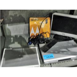 Shelf lot of assorted electronics