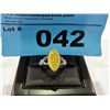 Image 1 : .27 Carat Yellow Diamond Cocktail Ring